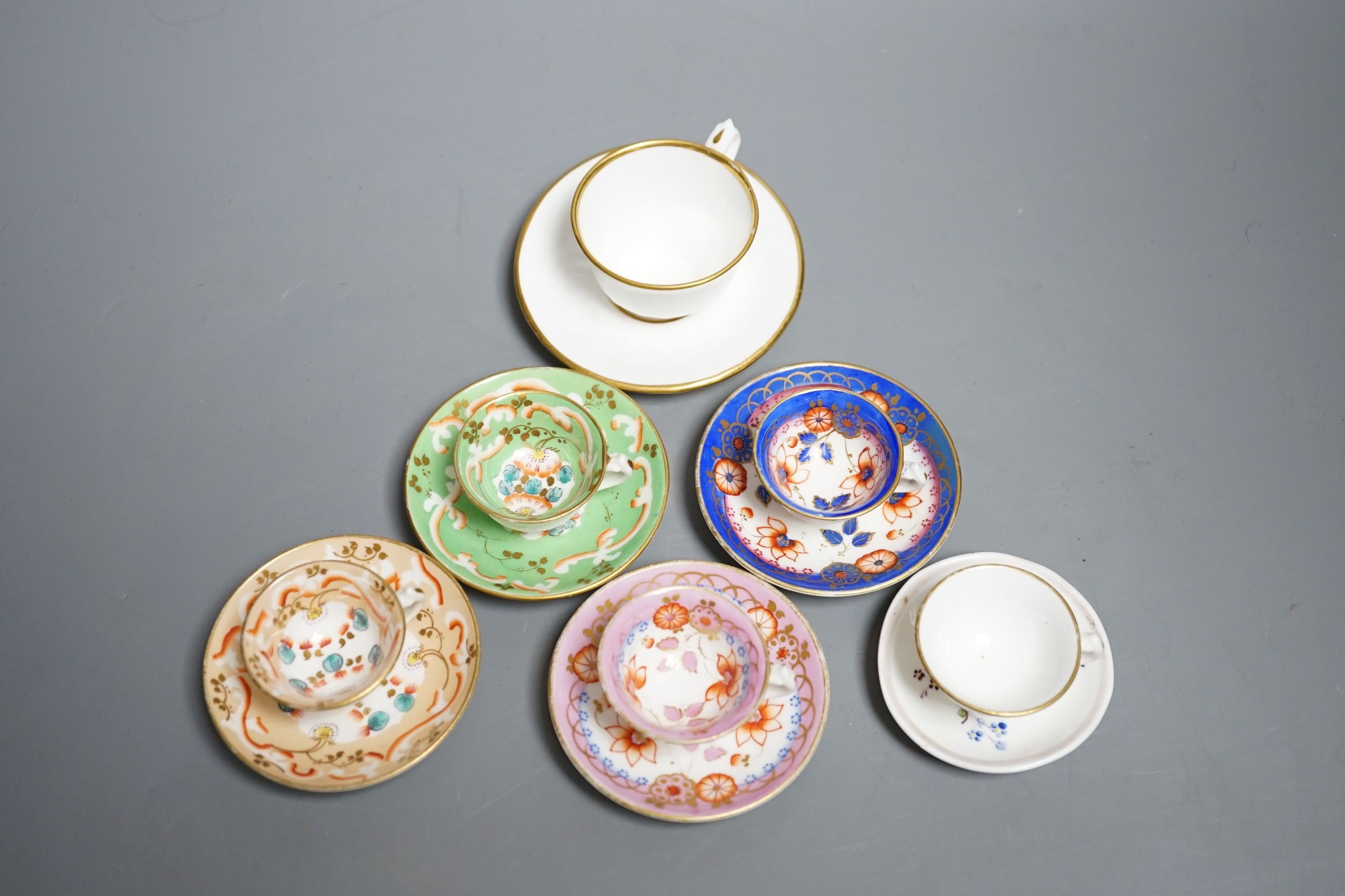 Five Staffordshire miniature teacups and saucers, possibly Alcock and a Hicks & Meigh miniture teacup and saucer, c. 1820. Provenance - Mona Sattin collection of miniature cups and saucers, collection no.s 135, 138-141,